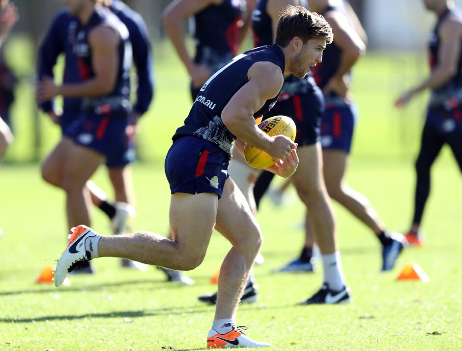 AFL 2016 Training - Melbourne 040516 MELBOURNE, AUSTRALIA - MAY 04: Jack Viney of the Demons runs with the ball during a Melbourne Demons AFL training session at Goschs Paddock on May 4, 2016 in Melbourne, Australia. (Photo by Robert Cianflone/Getty Images/AFL Media)
